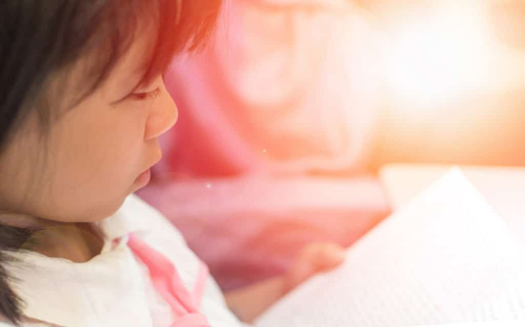 Girl-reading-book-Featured