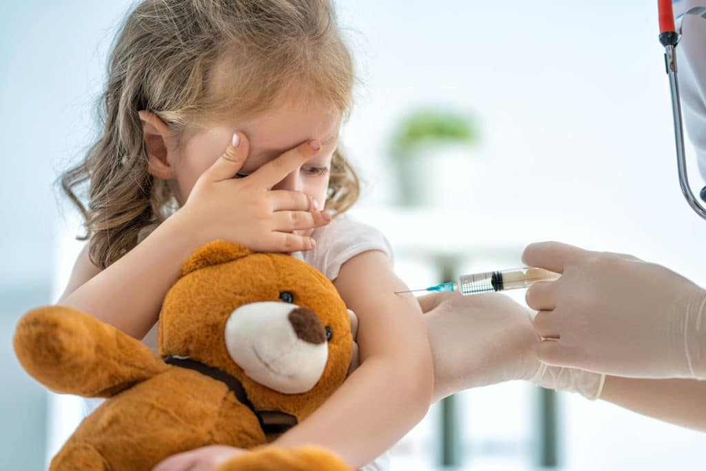 girl-getting-flu-vaccination