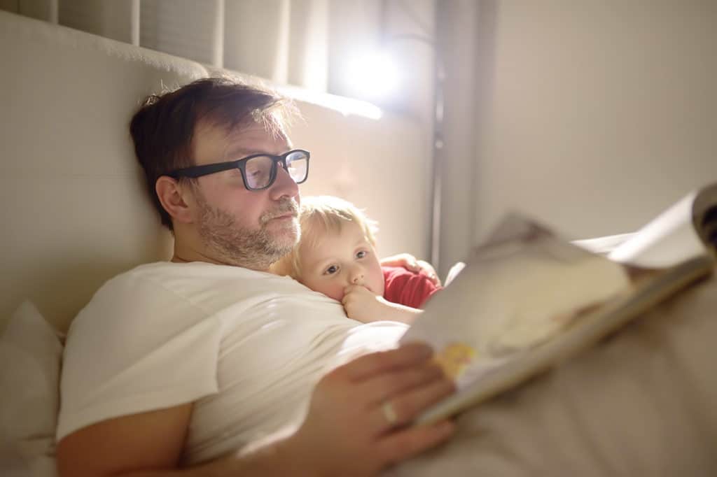 Dad-reading-to-son