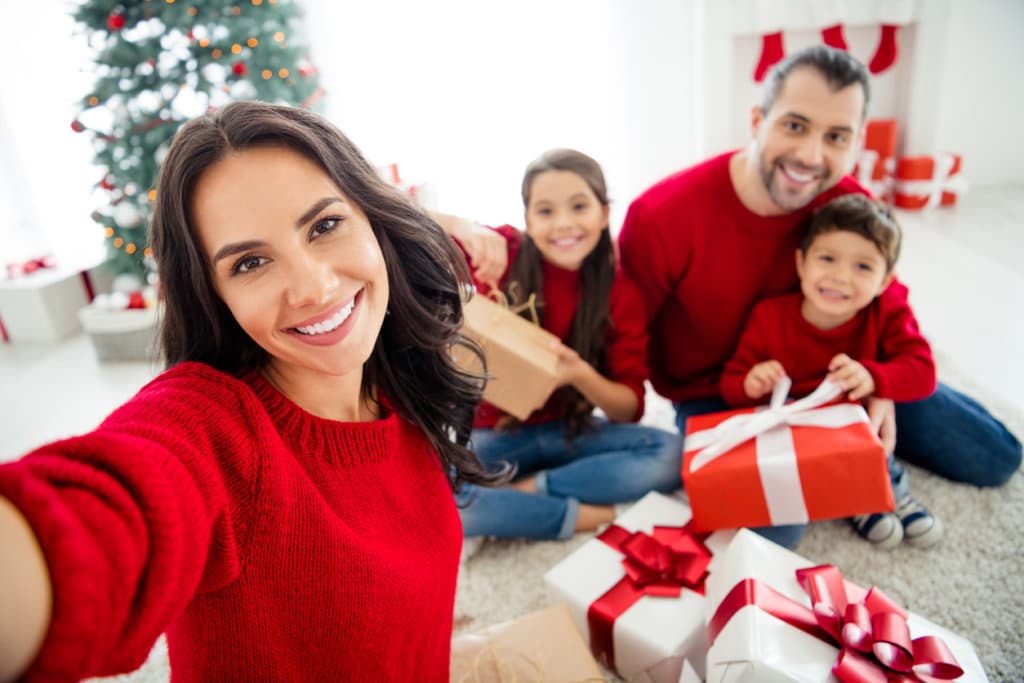 Self-portrait of nice attractive idyllic sweet kind careful adorable cheerful cheery, dreamy big full foster family celebrating spending newyear time eve noel day light white interior living-room