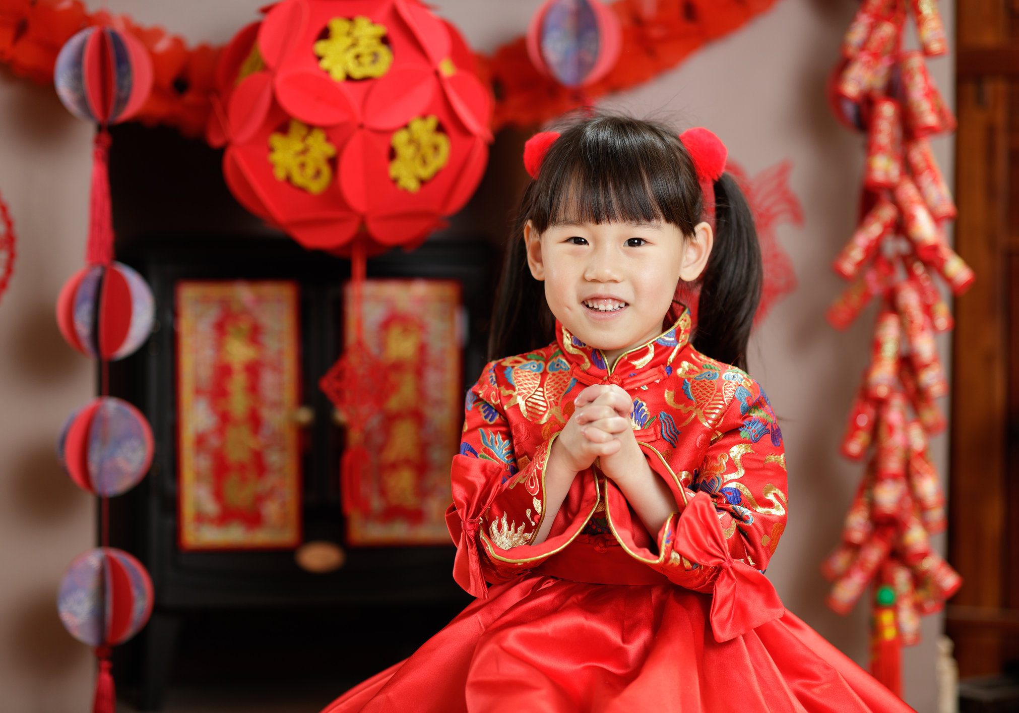 young Chinese girl with traditional dressing up celebrate Chinese New Year